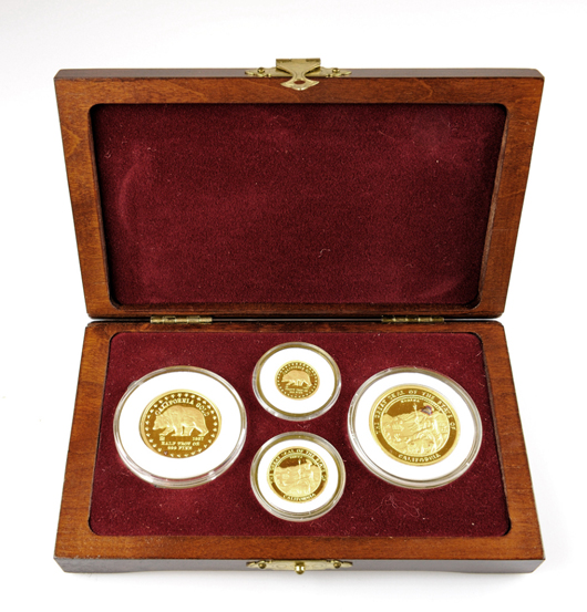 Set of four gold coins from California Gold Rarities Mint, $3,000. Morton Kuehnert Auctioneers image.