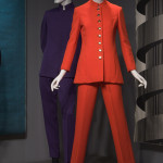 A purple wool man’s suit by Jacques, circa 1965, and a red wool woman’s suit by Tape Measure, circa 1967, are displayed together in ‘His and Hers,’ an exhibit at the Museum at the Fashion Institute of Technology in New York. Image courtesy Fashion Institute of Technology.