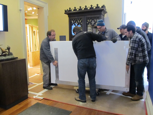 A team of eight art handlers and conservators transported The Chertoff Mural from a truck into the Rosenbach Museum & Library's Maurice Sendak Gallery on Jan. 19. Credit: Elyse Poinsett, Rosenbach Museum & Library.