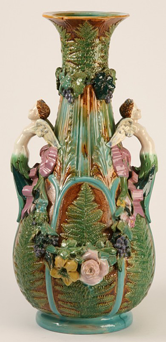 Early 20th-century English majolica vase with handles in the form of cherubs, 23 inches high. Estimate: $1,200-$2,500. Image courtesy of Great Gatsby’s.