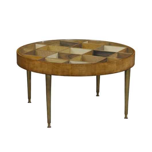The Sampler Table featuring 14 different wood species, designed by the Keno Bros. Image courtesy of Theodore Alexander.