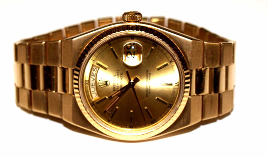 Men’s 18K gold Rolex wristwatch. Image courtesy of Austin Auction Gallery.