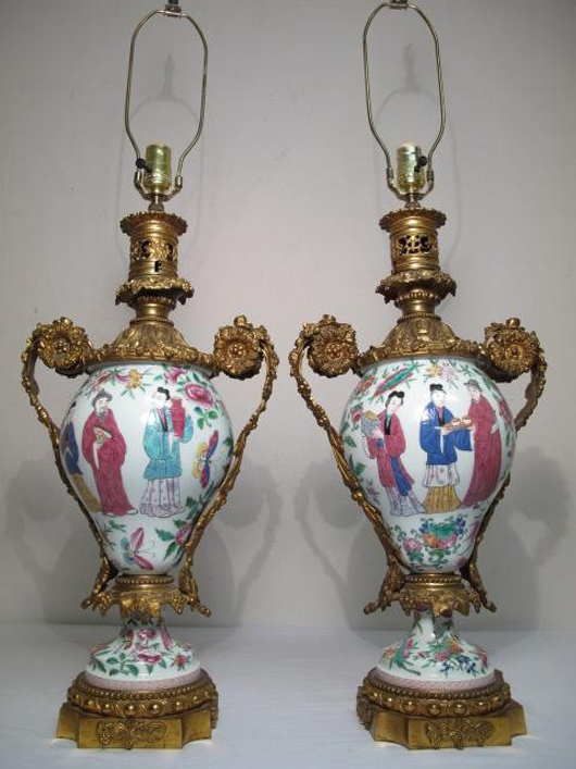 Pair of Famille Rose bronze ormolu urns mounted as lamps, late 19th/early 20th century. Estimate $700-$900. Auctions Neapolitan image.