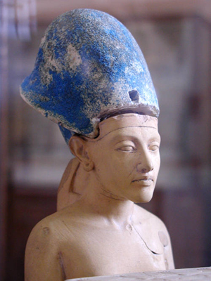 The statue of Pharaoh Akhenaten was found beside a trash can. Image by Jon Bodsworth, courtesy of Wikimedia Commons.