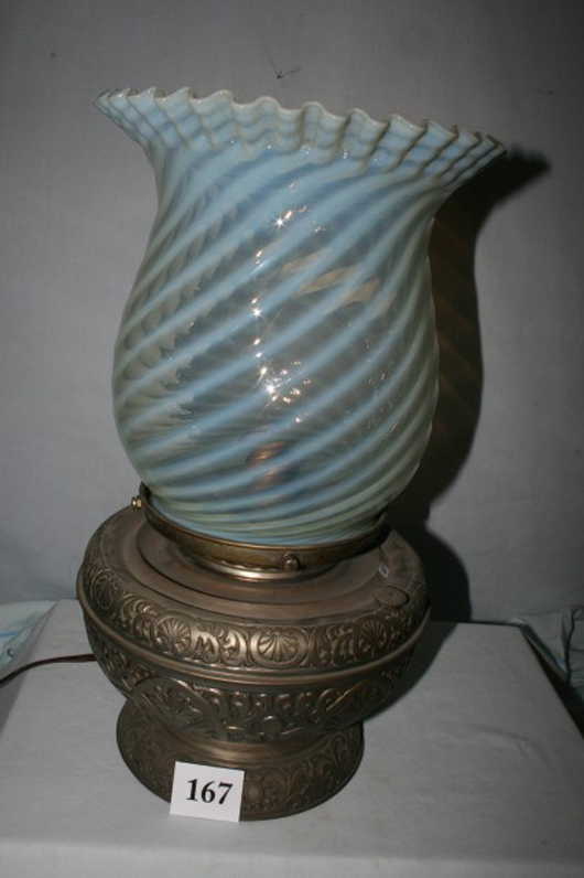 Oil lamp fixture converted to electric, ruffled opalescent swirled shade, 19 inches high x 10 1/2 inches in diameter. Image courtesy of Old Barn Auction.