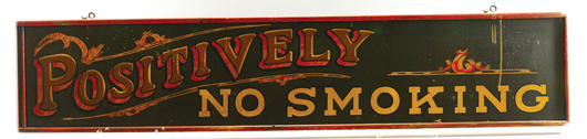 Circa-1900 hand-painted tin sign from train station, “Positively No Smoking,” 73 inches wide. Estimate $1,500-$1,700. Bertoia Auctions image.