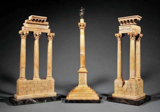 Early 19th-century giallo di Siena marble three-piece grand tour garniture representing the Ruins of the Temple of the Heavenly Twins Castor and Pollux; the Temple of Vespian; and the Column of Phocas, sold for $26,290. Image courtesy of Neal Auction Co.