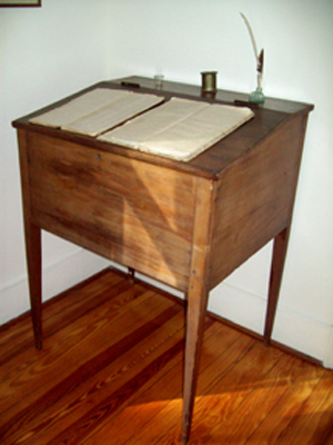 What appeared to be the oldest item in the house was a country made schoolmaster’s or clerk’s desk with 20-inch-wide boards and mortise and tenon joints secured by trenails.