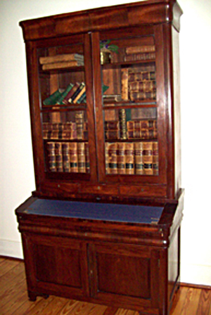 One of my first questions to the ranger was, “What is the oldest piece in the house?” The answer was a disappointing nod to a bookcase secretary that the notes said was from the 1700s. It was nice secretary but it was not quite that old. In fact, not even that century. It was an Empire piece with ogee curves, crotch-cut mahogany veneer and 19th-century cylinder glass. While it was contemporaneous to the house it was not the oldest piece there.