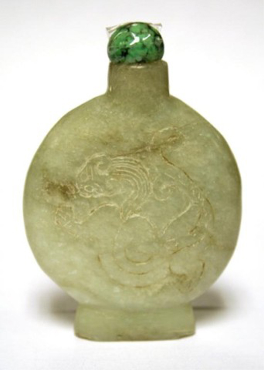 White nephrite jade snuff bottle incised with longevity character and dragon. Estimate: $5,500-$6,500. Image courtesy of Showplace Antique & Design Center.