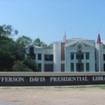 Hurricane Katrina heavily damaged the original Jefferson Davis Presidential Library building, which was later razed. Image courtesy of Wikimedia Commons. This file is licensed under the Creative Commons Attribution ShareAlike 3.0 License.