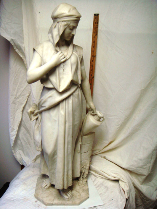 Spectacular 36-inch-tall carved marble statue titled ‘Rebecca at the Well’ and signed F. Vichi Firenile. Image courtesy of Tim’s Inc.