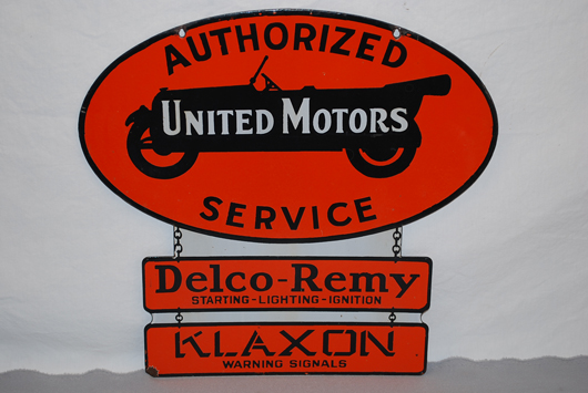Hard-to-find United Motors Authorized Service double-sided porcelain die-cut sign sold for $5,225. Image courtesy of Matthews Auctions LLC.