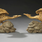 A charming pair of George III Rococo giltwood and carved ho-ho birds, circa 1760, in the manner of Thomas Chippendale, standing on rocaille bases, on the stand of Charles Mackinnon at the BADA Fair opening in London on March 23. Image courtesy Charles Mackinnon and BADA.