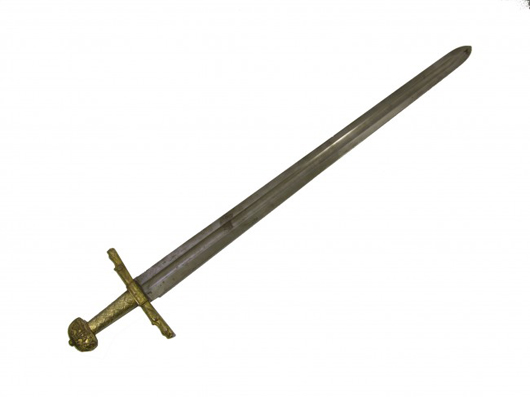 ‘Indiana Jones and the Last Crusade’ sword (1989). – This is the hero metal sword from the film’s finale where the old knight confronts Indy. Estimate: $5,000-$6,000. Image courtesy of Premiere Props.