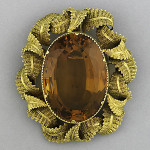 Gold and citrine brooch/pendant. Estimate: $600-$900. Image courtesy of Rago Art and Auction Center.