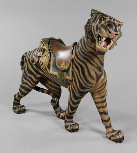 Brunk devoted an entire page in the color catalog to this saddled carousel tiger. The outside row stander measured 54 inches high, 66 inches long and 17 inches wide. It sold for $25,200. Image courtesy of Brunk Auctions.