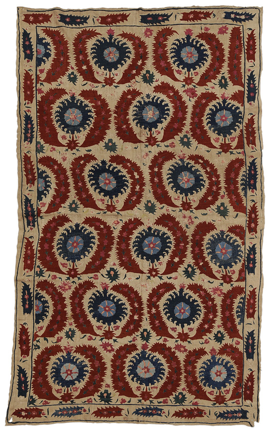 No single lot exceeded its estimate more than this fine embroidered silk cover probably from the 19th century. The cover consisted of three joined panels, 86 inches by 49 inches, with a border of red serrated leaves and central blue pinwheel flowers. It sold for $45,600. Image courtesy of Brunk Auctions.