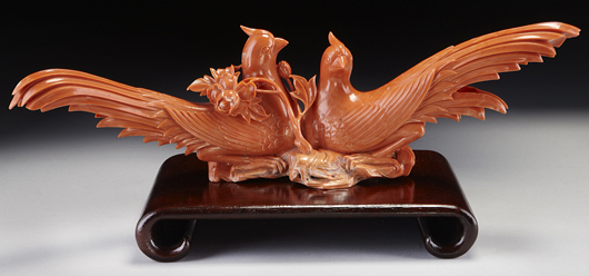 Chinese carved red coral pigeons perched on a rock, with peony blossoms, 4 inches high x 13.5 inches wide, circa 20th century. Price realized: $58,187.50. Image courtesy of Dallas Aucton Gallery.