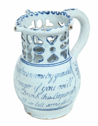 Find a way to get your drink from this jug with cutouts. It is an 18th-century English Delft mug about 7 inches tall that's decorated with piercings and an appropriate rhyme. It sold for $2,938 last year at Garth's Auctions in Delaware, Ohio.