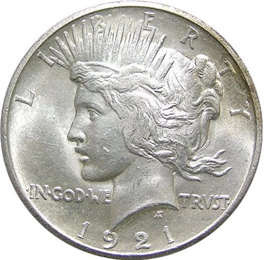 A genuine U.S. silver dollar struck in 1921 and known as a 'Peace' dollar because it commemorated the signing of formal peace treaties between the Allied forces, Germany and Austria. 