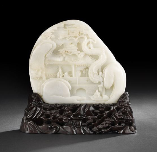 Chinese carved white jade double-sided landscape, estimate $9,000-$12,000. New Orleans Auction Galleries image.