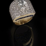 18K yellow gold, diamond and sapphire ring by David Web with central 6.67-carat marquise-cut diamond, estimate $50,000-$80,000. New Orleans Auction Galleries image.