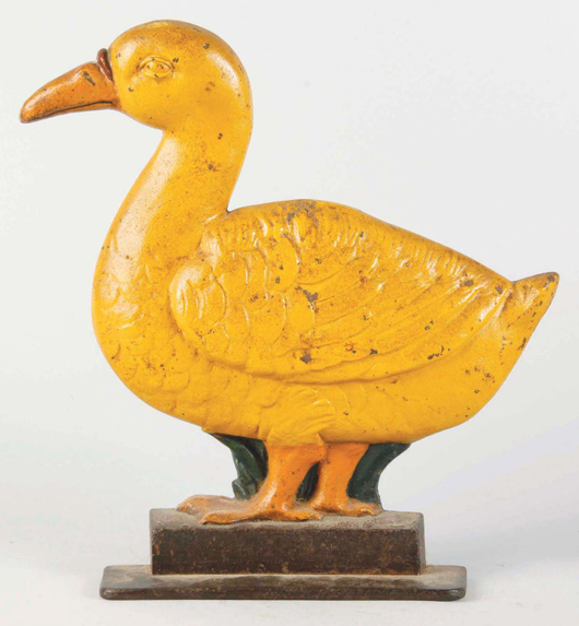 Cast-iron duck doorstop, 14 inches tall, only known example, shown in John and Nancy Smith’s The Doorstop Book, estimate $3,500-$4,500. Morphy Auctions image.