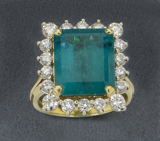 The Columbian emerald in this ring is 7.0 carats and is complemented with 18 round brilliant-cut diamonds weighing 1.20 carats. Image courtesy of Dallas Auction Gallery.