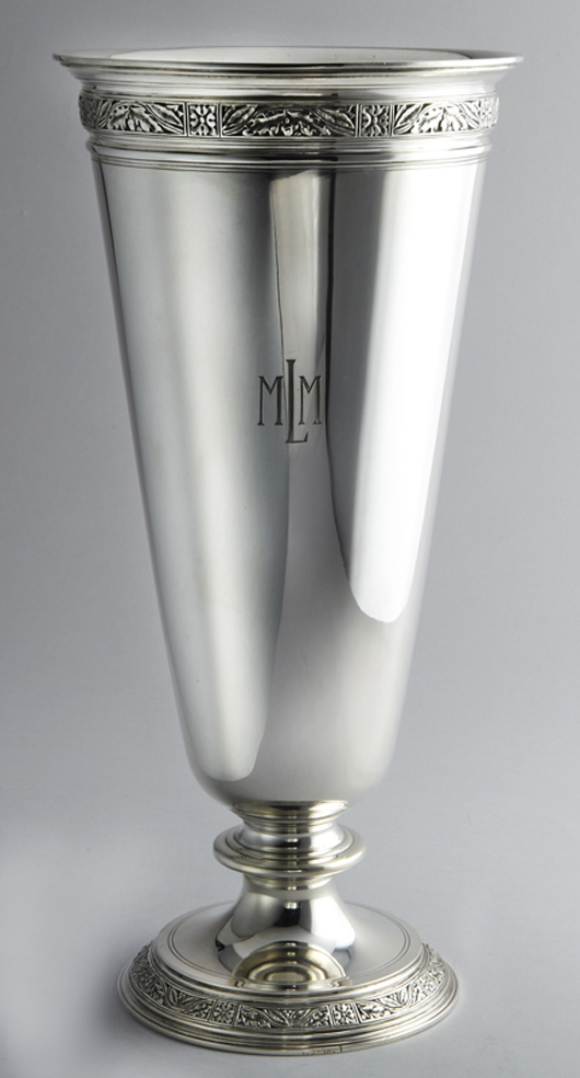 Tiffany sterling silver Art Deco vase, both rims with finely chased banded borders of alternating panels of acorns with oak leafs and rosettes. Monogrammed ‘MLM’ (est. $7,000-$9,000). Image courtesy of Dallas Auction Gallery.
