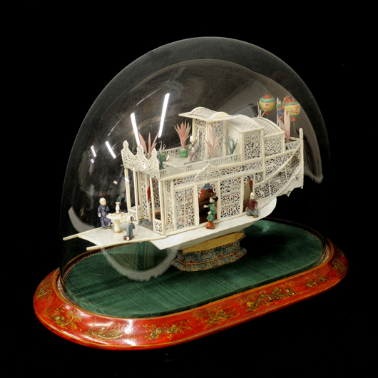 Pierced bone carved ship under glass dome, China, 19th century, 14 1/2 inches x 20 inches x 12 inches. Estimate: $4,000-$5,000. Image courtesy of Morton Kuehnert Auctioneers & Appraisers.
