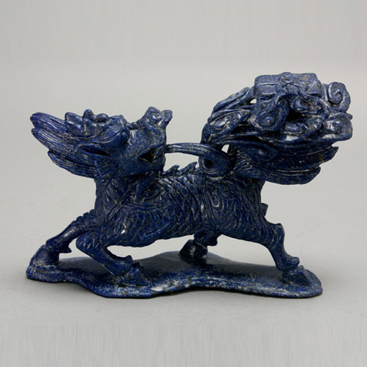 Lapis lazuli qilin with books, 8 inches long. Estimate: $500-$700. Image courtesy of Michaan’s Auctions.