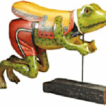 The frog from the book ‘Wind in the Willows’ probably inspired the look of this carved wooden carousel animal. It may be the only figure on an old carousel dressed in human clothes. It sold in February 2011 at a James D. Julia auction (JamesDJulia.com) in Fairfield, Maine, for $11,900.