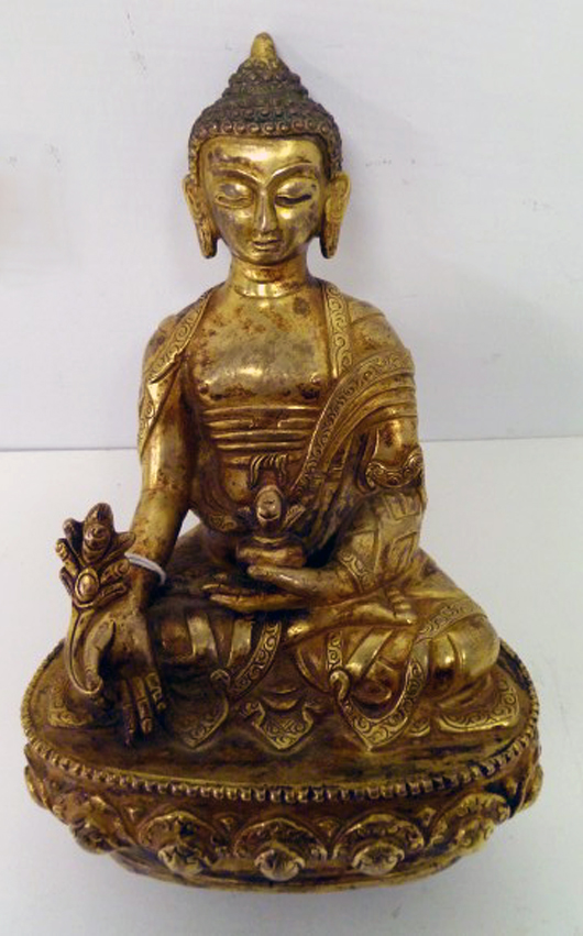 Gilt-bronze Tibetan Sakyamuni "touching the Earth," 18th-19th century, 6 7/8 inches tall, est. $6,500-$8,000. Asian Antiques Gallery.