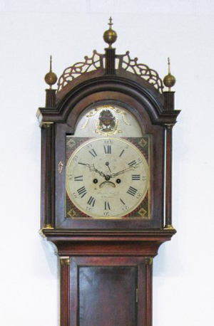 Signed by the renowned clock maker Simon Willard, this early 19th century tall-case clock was the top seller at the auction, making $32,900. Image courtesy of Gordon S. Converse & Co.