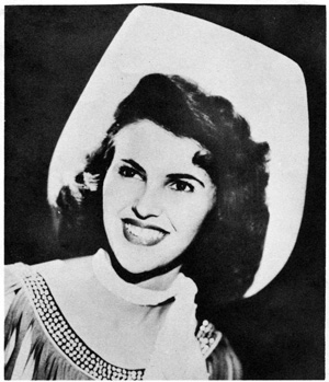 Wanda Jackson, ‘the queen of rockabilly,’ in a mid-1950s publicity photo. This file is licensed under the Creative Commons Attribution-Share Alike 3.0 Unported license.