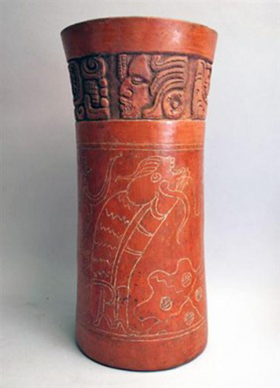 Giant published, carved Mayan cylinder. Image courtesy of Artemis Gallery.