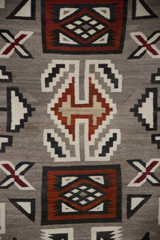 Navajo rug, 6ft. 10 in. x 4 ft. 1 in., with multiple design elements, est. $2,000-$3,000. Image courtesy of S.B. & Co.