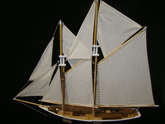 Planked model of a fishing schooner, 29 x 30 inches, est. $150-$200, one of several ship models in the sale. Tonya A. Cameron Auctioneers image.