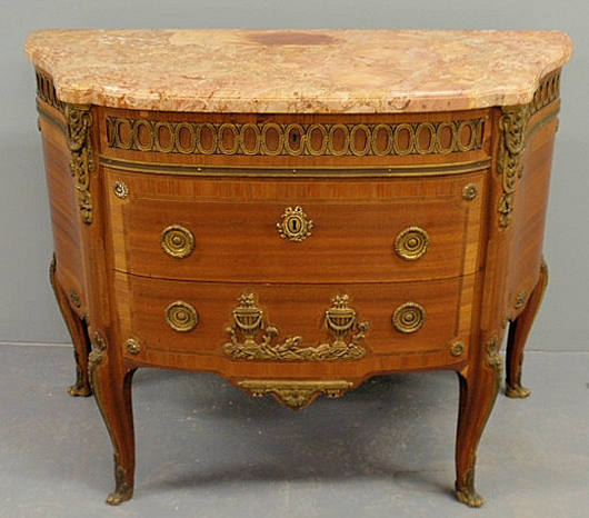 French marble-top Louis XVI-style chest of drawers, circa 1850, with brass ormolu mounts, with label ‘Paul Sormani, Paris,’ 34 inches high x 44 inches wide, 21 inches deep. Estimate: $1,500-$2,500. Image courtesy of Wiederseim Associates Inc.