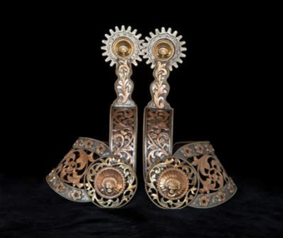 Edwart H. Bohlin custom-made filigreed spurs, constructed of 14k, 18k and 22k gold and sterling silver. Estimate: $15,000-$25,000. Image courtesy of Brian Lebel’s Old West Show & Auction.