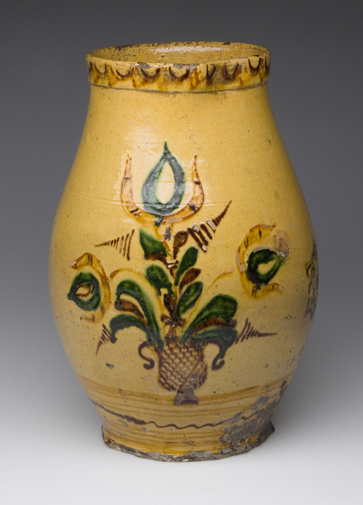 Virginia slip-decorated earthenware pitcher, circa 1810. Estimate: $8,000-$12,000. Estimate: Image courtesy of Jeffrey S. Evans & Associates.