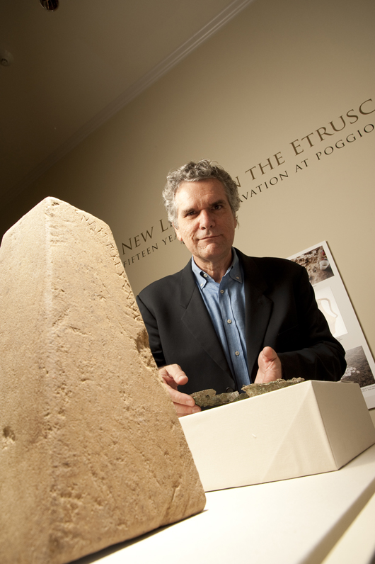 SMU Art History Professor Gregory Warden in a 2009 photograph taken at the Etruscan exhibit at Southern Methodist University's Meadows Museum. Image courtesy of SMU's Meadows School of the Arts.