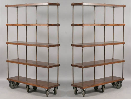 This pair of wood and metal industrial rolling shelf units, sold on June 11 for $4,800, could be used for either storage or display. Image courtesy Kamelot Auctions, Philadelphia.
