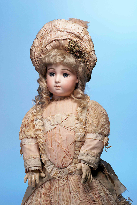 Of the Jumeau models known as ‘Triste,’ this 24-inch bebe is an outstanding example with long-face modeling and gentle expression, flawless pale bisque and beautiful costuming. Estimate: $13,000-$18,000. Image courtesy of Frasher’s Doll Auction.