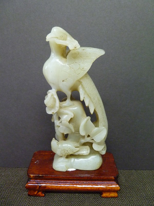 Jade carving of Phoenix bird, 19th century or earlier, est. $3,000-$4,500. Asian Antiques Gallery image.