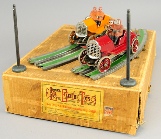 Boxed Lionel No. 84 racecars, tin autos with composition drivers, $12,650. Bertoia Auctions image.