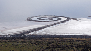 The Spiral Jetty juts out 1,500 feet into the Great Salt Lake about 90 miles north of Salt Lake City. This file is licensed under the Creative Commons Attribution-Share Alike 2.0 Generic license.