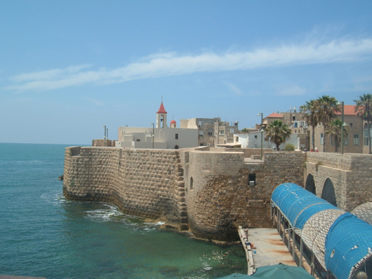 Pizani harbor walls and St. John's Church in Acre, Israel. Image courtesy of  Wikimedia Commons.