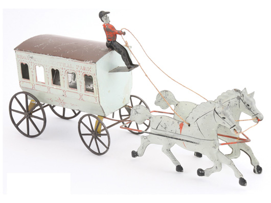 George Brown painted-tin horse-drawn omnibus stenciled 'Broadway & Central Park,' $12,980. Noel Barrett Auctions image.